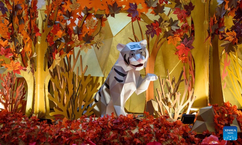 Photo taken on Jan. 11, 2022 shows an art work at the Pavilion Paper Art Garden in Kuala Lumpur, Malaysia. The Pavilion Paper Art Garden, with splendid traditional Chinese art of paper cutting works, was set in celebrations of the upcoming Chinese New Year.(Photo: Xinhua)